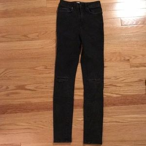 Black high waisted skinny jeans with ripped knees